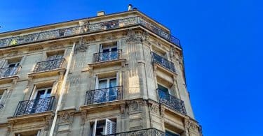 beige concrete high-rise building