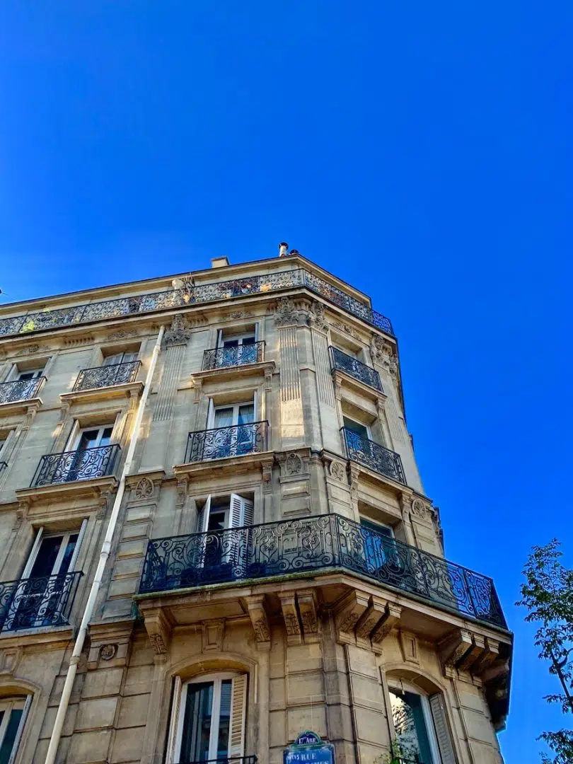 beige concrete high-rise building